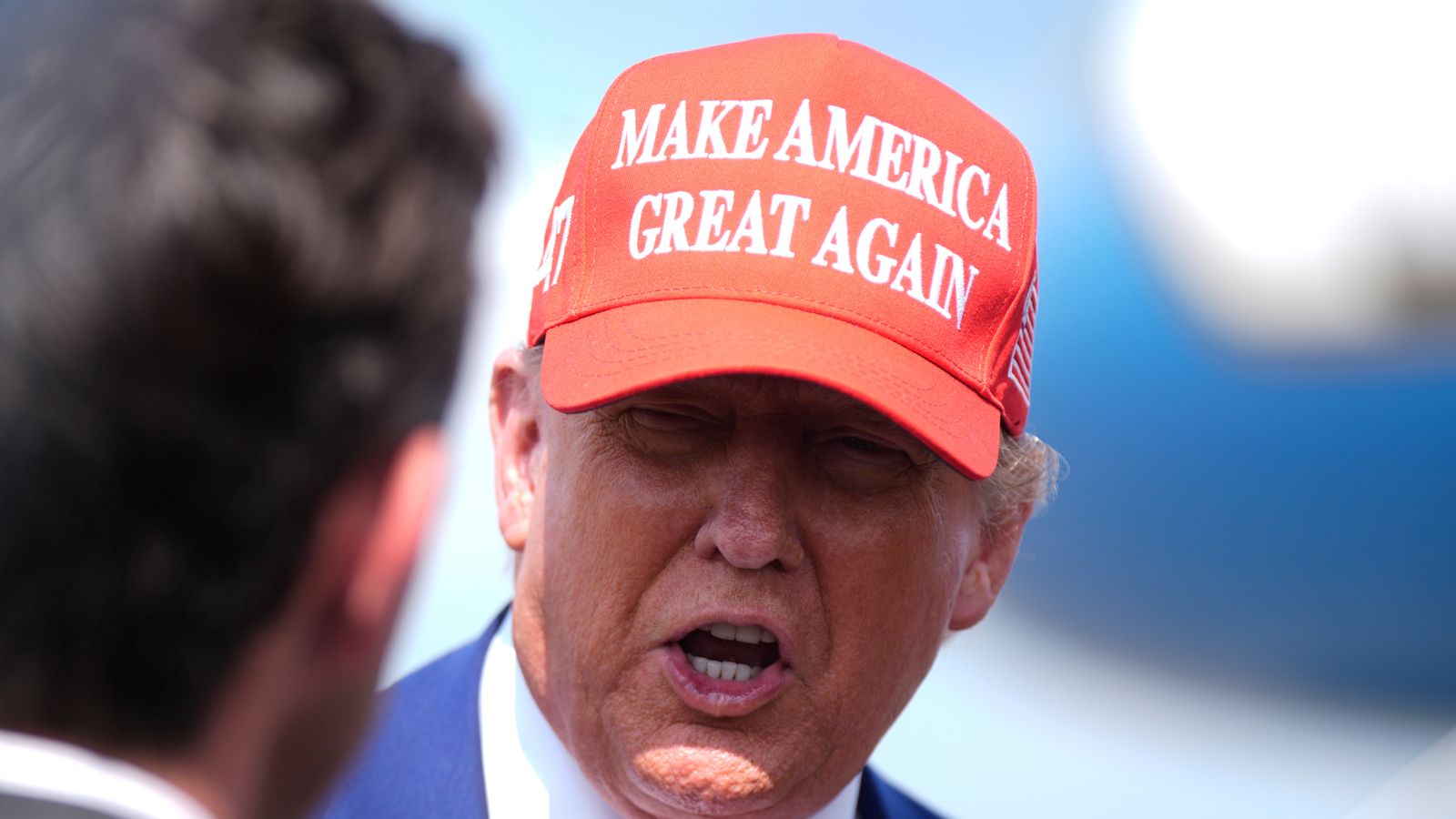 President Donald Trump speaks with reporters upon arriving at Morristown Municipal Airport in Morristown, N.J., Friday, June 20, 2025. (AP Photo/Manuel Balce Ceneta)