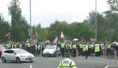 Anti-immigrant protests gather at a roundabout in Norwich