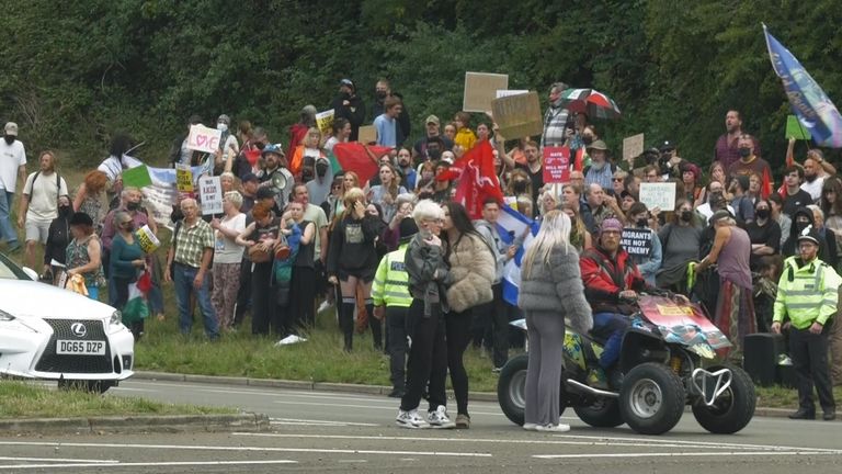 Pro-immigrant protesters gather at a roundabout in Norwich
