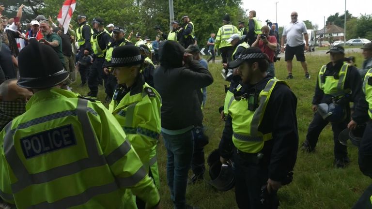 Police make an arrest at an anti-asylum protest in Norwich