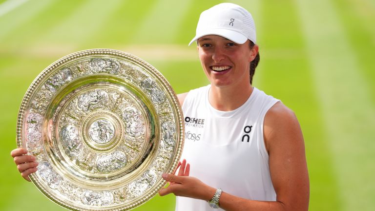 Iga Swiatek with the Venus Rosewater Dish. Pic: PA 