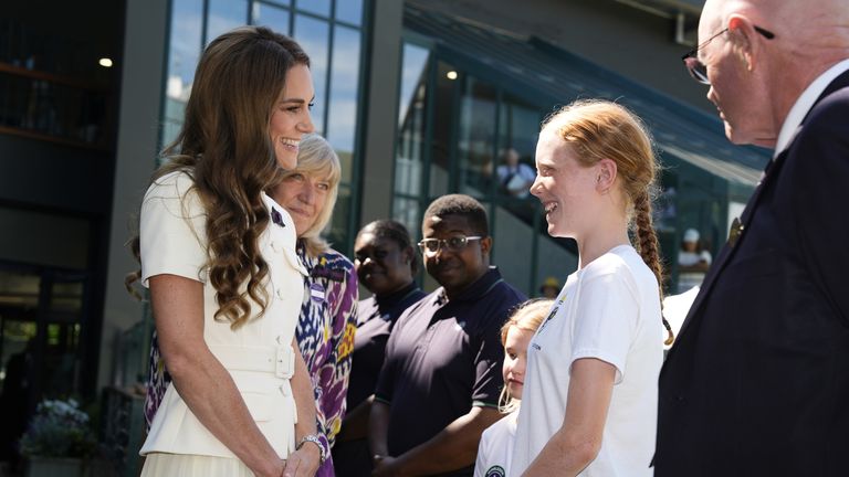 The Princess of Wales meeting Sophie Kneen as she arrives to attend the Ladies' Singles Final on day thirteen of the 2025 Wimbledon Champion