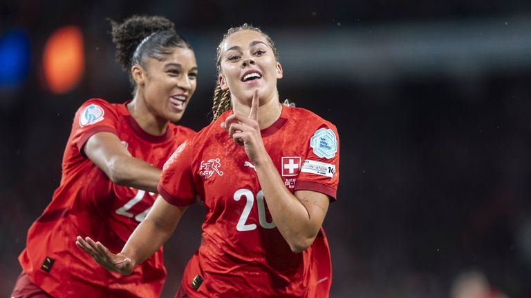 Switzerland's Alayah Pilgrim, right, celebrates with teammate Sydney Schertenleib