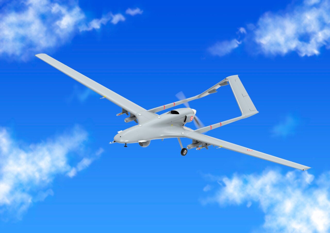 Bayraktar TB2 unmanned aerial vehicle gliding through the clouds.