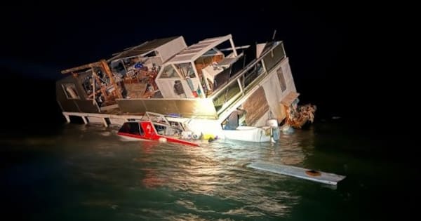 Two people, dog rescued from sinking houseboat north of Auckland