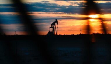Oil prices edge lower on surprise US stock build