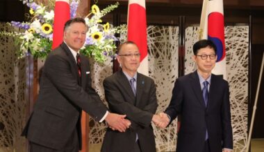 U.S. Deputy Secretary of State Christopher Landau, Japanese Vice Foreign Minister Takehiro Funakoshi and South Korean Vice Foreign Minister Park Yoon-joo (from L to R) pose for a photo ahead of their trilateral talks in Tokyo on July 18, 2025. (Image courtesy of  Yonhap)
