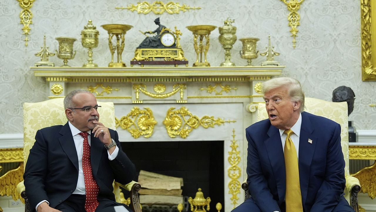 President Donald Trump and Bahrain's Crown Prince Salman bin Hamad Al Khalifa speak in the Oval Office of the White House, Wednesday, July 16, 2025, in Washington. (AP Photo/Alex Brandon)