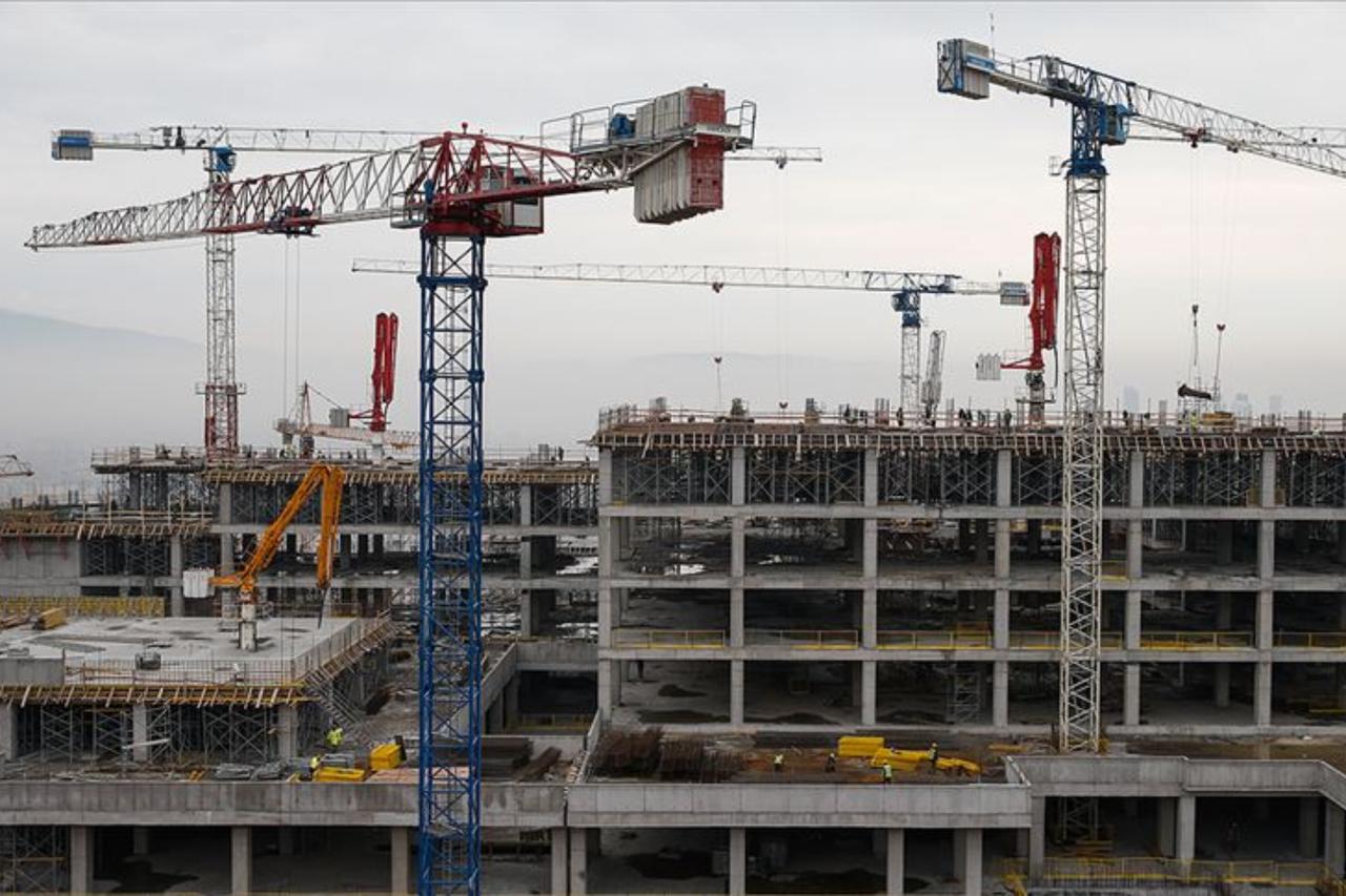 Construction cranes operate at a large-scale building site in Türkiye, accessed on July 4, 2025. (AA Photo)