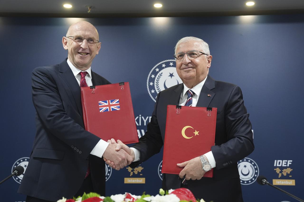 Defense Minister Yasar Guler (R) and British Defense Secretary John Healey (L) sign a comprehensive memorandum of understanding regarding Türkiyes acceptance as a Eurofighter Typhoon user in Istanbul, Türkiye, July 23, 2025. (Photo via Turkish MoD)