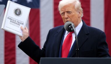 Why are stocks at record highs despite looming tariffs? : NPR