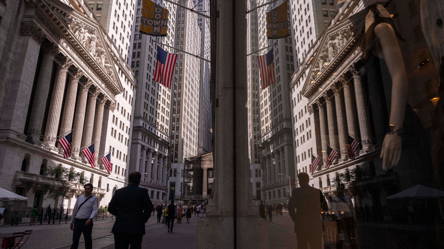 Wall Street moves lower and pulls the S&P 500 back from its record