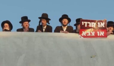 Ultra-Orthodox Jews block highway in Jerusalem to protest enlisting for military service