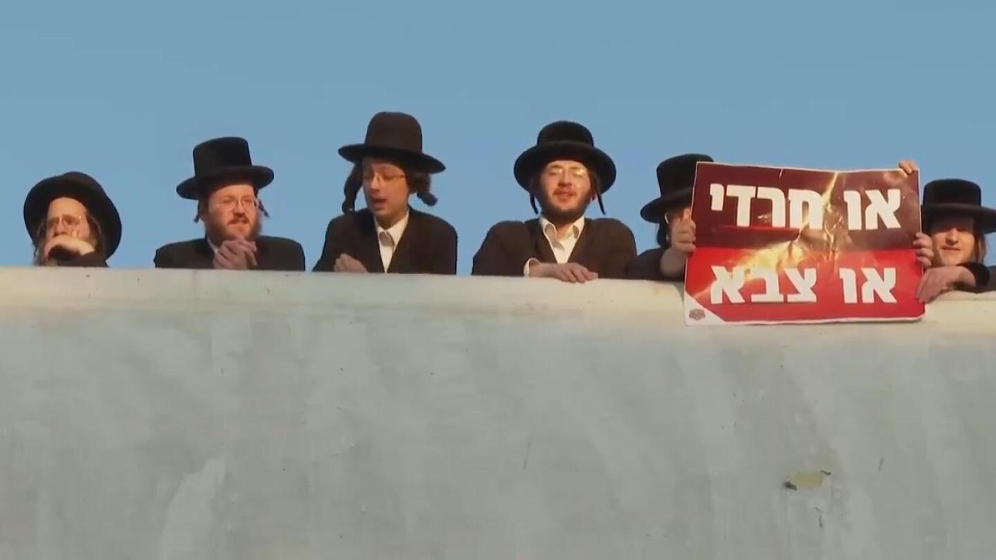 Ultra-Orthodox Jews block highway in Jerusalem to protest enlisting for military service