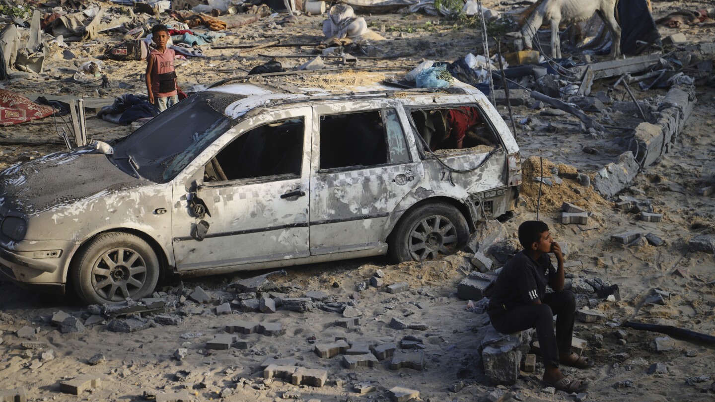 Israeli fire kills dozens in Gaza as aid delivery still hampered by chaos