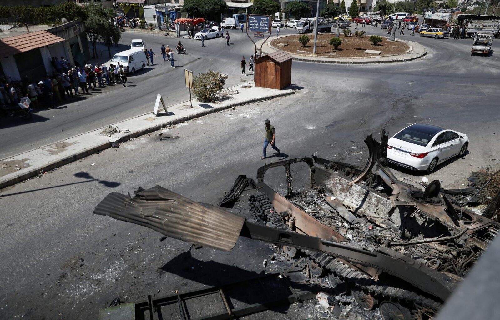 In Syria’s Sweida, the stench of death still lingers days after sectarian bloodshed