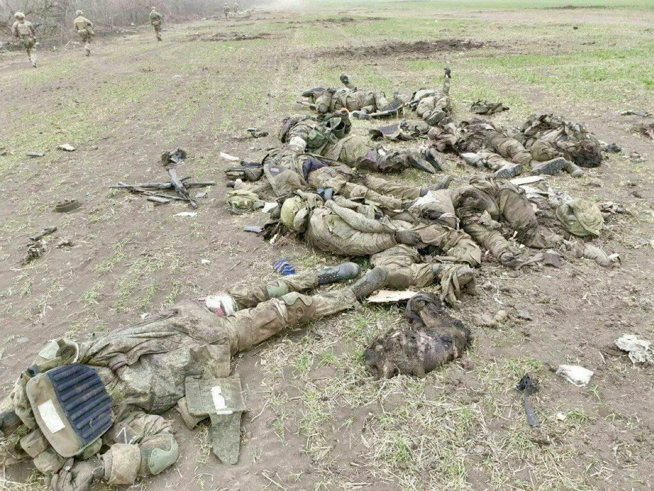 The Russian Army and Russki Mir, ladies and gentleman. I bet these casualties still lie where they were dragged out of the way like this, minus bank cards, watches, etc.