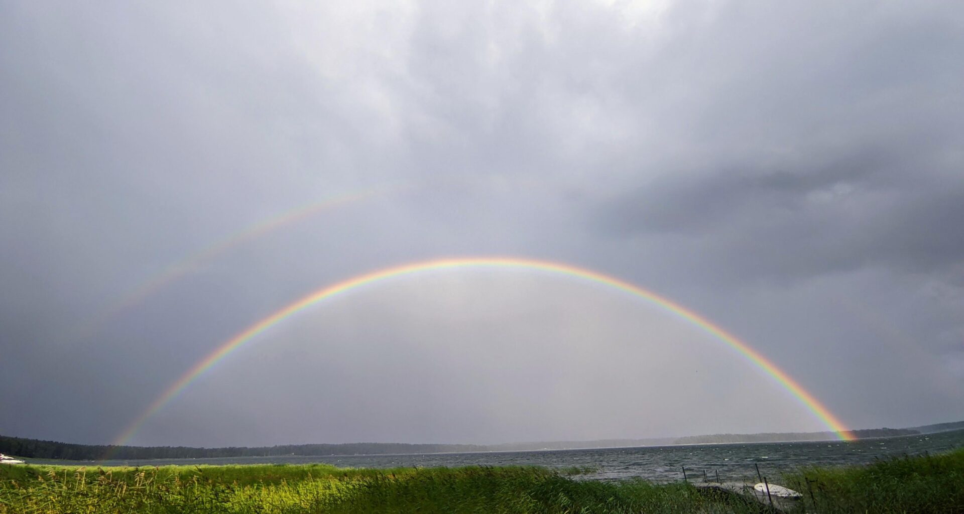 Double rainbow over the sea tonight