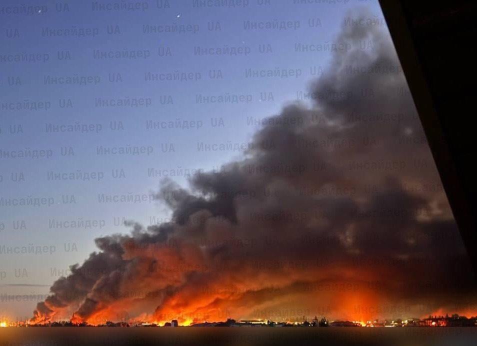 The skyline of the Ukrainian capital city of Kyiv - as buildings are ablaze from hours of Russian kamikaze drone and missile strikes.