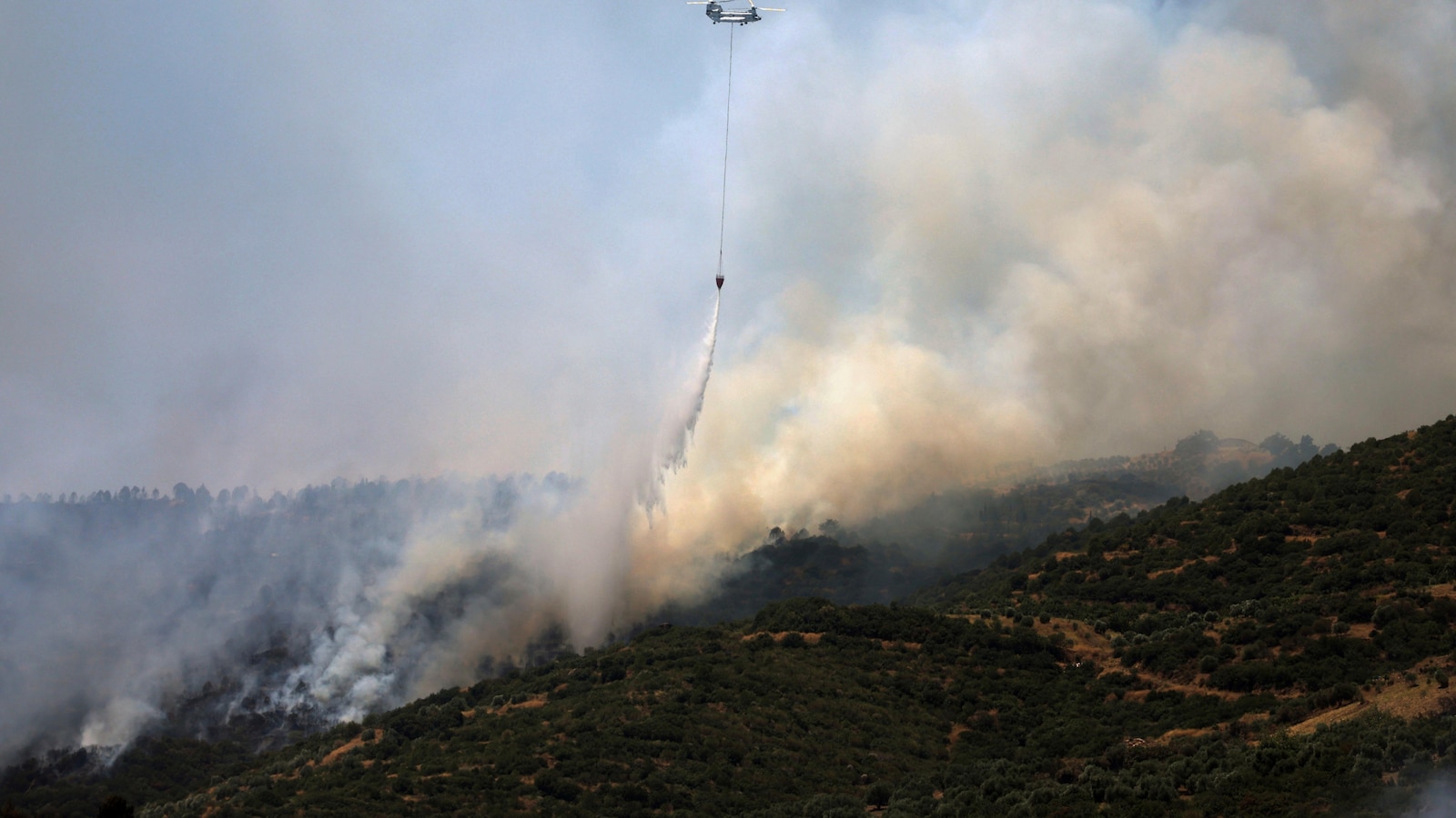 Turkey sends firefighting aircraft to Syria as wildfires rage on both sides of the border
