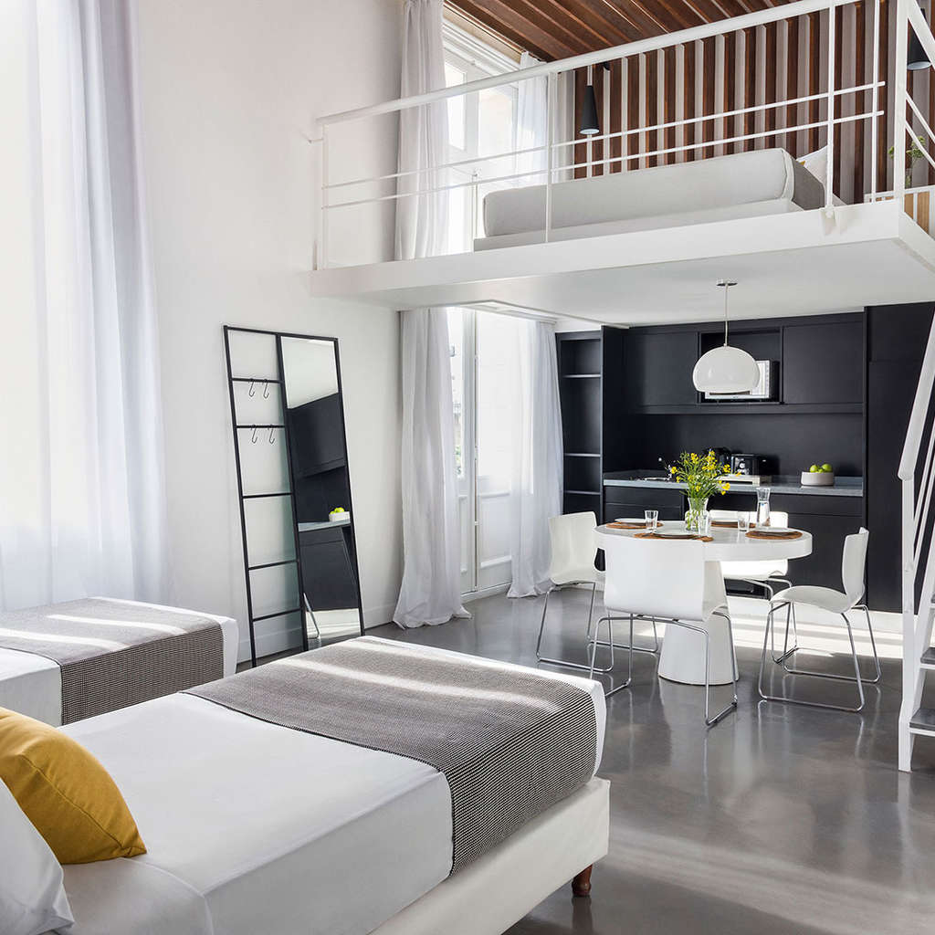 The modern aesthetic at HTL Hoteles is the canvas. The real experience is painted with the personalized, human-centric service that drives their strategy. — Photo by Shiji