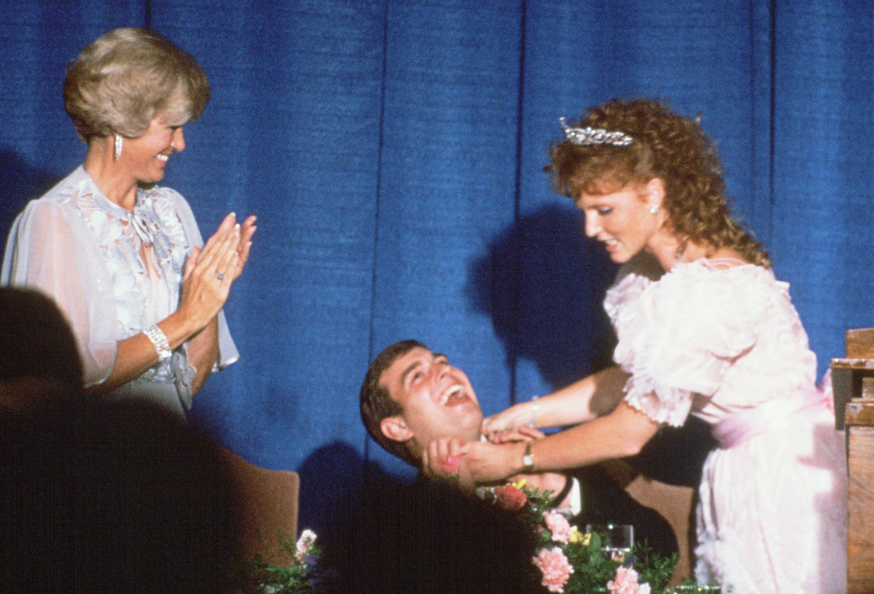 Sarah Ferguson playfully teases Prince Andrew on stage.