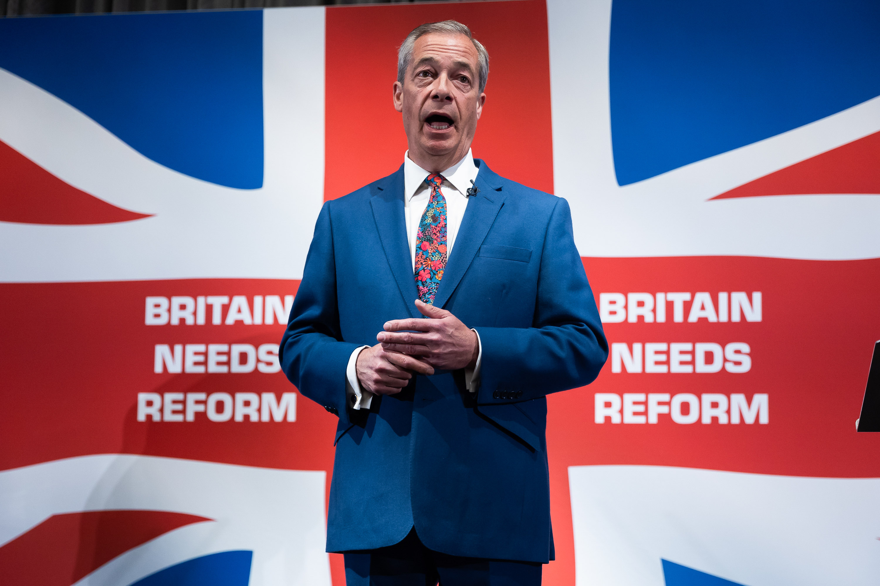 Nigel Farage speaking at a Reform UK press conference.