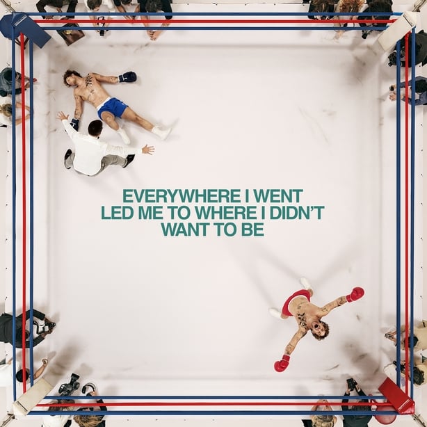 The cover of Tom Grennan's album shows a boxing ring where he has knocked himself out