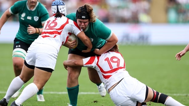 24 August 2025; Ellena Perry of Ireland in action against Japan players Kotomi Taniguchi, left, and Ayano Sakurai during the Women's Rugby World Cup 2025 Pool C match between Ireland and Japan at Franklin's Gardens in Northampton, England. Photo by Harry Murphy/Sportsfile