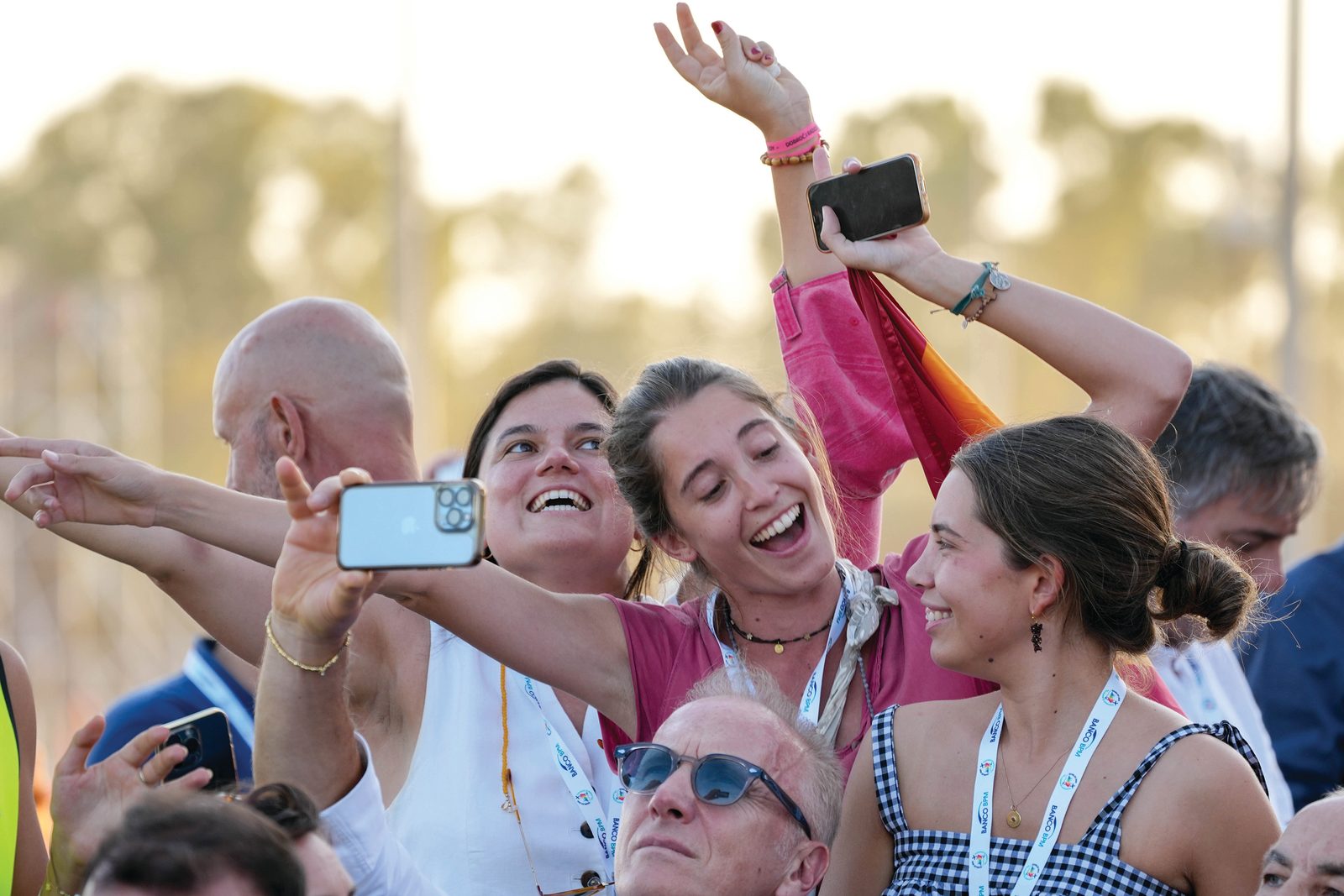 Young pilgrims cheer as they await the start of the vigil with Pope Leo XIV at Tor Vergata in Rome Aug. 2, 2025, during the Jubilee of Youth. (CNS photo/Lola Gomez)