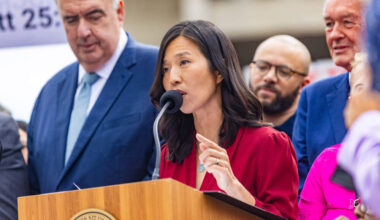 Mayor Michelle Wu, joined by community members and elected officials, responds to the recent letter from the Department of Justice at a press conference at City Hall Plaza. (Jesse Costa/WBUR)