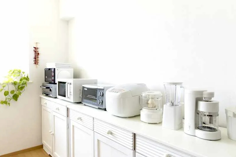 Japan kitchen with small cooking appliances are lined up