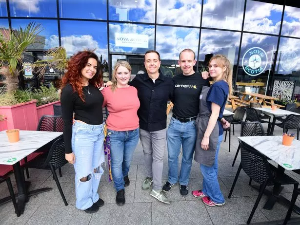 The team at Novia Scotia Restaurant,Mann Island,including Iain Hoskins(Director)centre,with ltr Laura Arroyo,Andrea Bravender,Liam Cato and Kseniia Bilenko