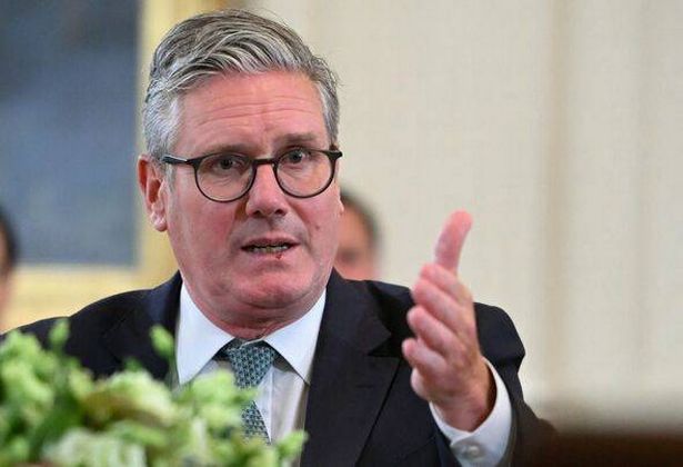 Keir Starmer talking at a political meeting