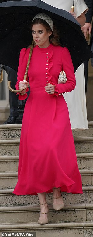 Beatrice turned heads in Beulah's crimson Christina dress, complete with pearl buttons and a frilled high neckline, at Buckingham Palace Garden Party