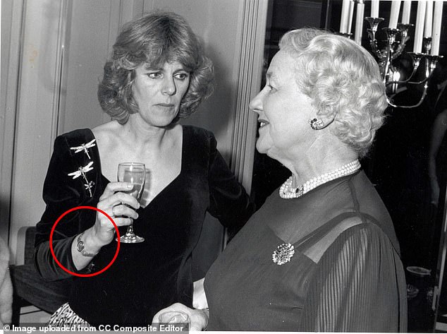 Camilla wearing a bracelet (circled) that was emblazoned with the initials G and F - a reference to Charles and Camilla's pet names for each other, Gladys and Fred