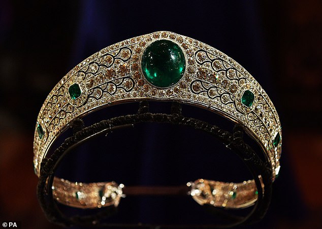 The Art Deco Greville tiara boasts a 93.70 carat emerald and six further faceted emeralds set on either side. The piece remained in the Queen Mother's jewellery collection until her death in 2002