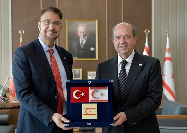 The Greek Cypriot government condemned the ‘unacceptable’ trip by Labour’s Afzal Khan (left), piling pressure on Sir Keir Starmer to sack him Above, the Labour MP with the Turkish Cypriot leader Ersin Tatar (right)