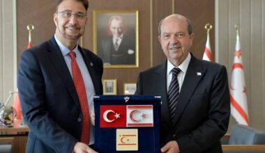 The official Cypriot government condemned the 'unacceptable' trip by Labour's Afzal Khan (left), piling pressure on Sir Keir Starmer to sack him Above, the Labour MP with the Turkish Cypriot leader Ersin Tatar (right)