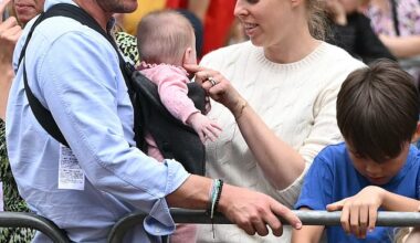 Princess Beatrice her husband Edoardo Mozzi (CL) and children Sienna, Athena and Christopher joins fans lining the Mall waiting to greet the bus carrying the England women's national football team during the homecoming victory parade near Buckingham Palace in London on July 29, 2025