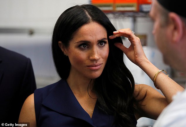 Meghan when she was a working royal in 2018. The Duchess has in the past expressed her frustration at the intense public scrutiny she encountered as a working royal and claimed the constant barrage of criticism was detrimental to her well-being