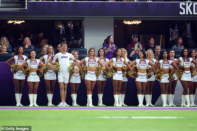 Minnesota Vikings cheerleader Louie Conn lines up with his colleagues on Saturday