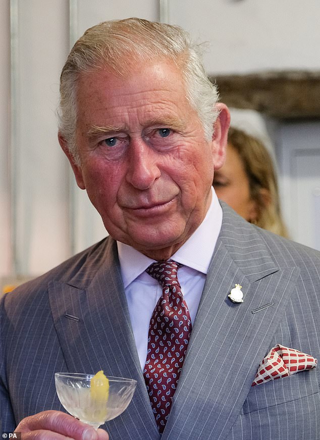 Charles enjoying a cocktail in 2018. He also likes to travel with a premixed martini at hand during events