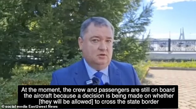 Dmitry Koschenko, mayor of Russian city Nizhnevartovsk suggested there were delays in allowing the passengers to clear the FSB-controlled border post - which was why they were being held on the aircraft