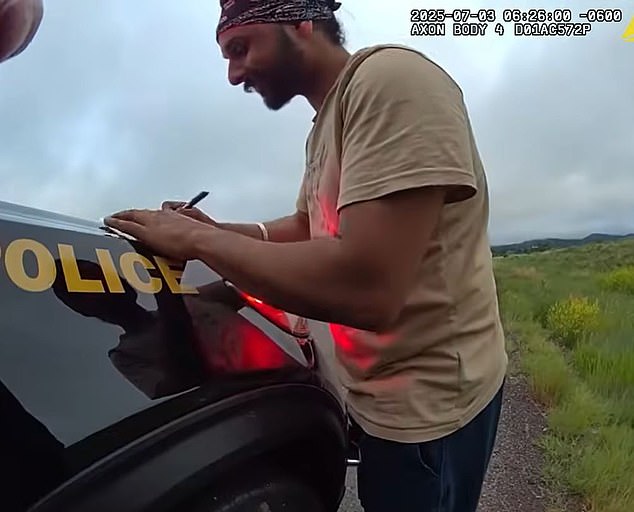 Singh, pictured during the July 3 traffic stop, had a full conversation with the trooper, answering the officer's questions and even raising some of his own