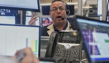 Stocks pull back from their latest all-time highs on Wall Street