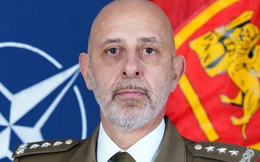 Rodolfo Sganga poses for an official NATO photo. 