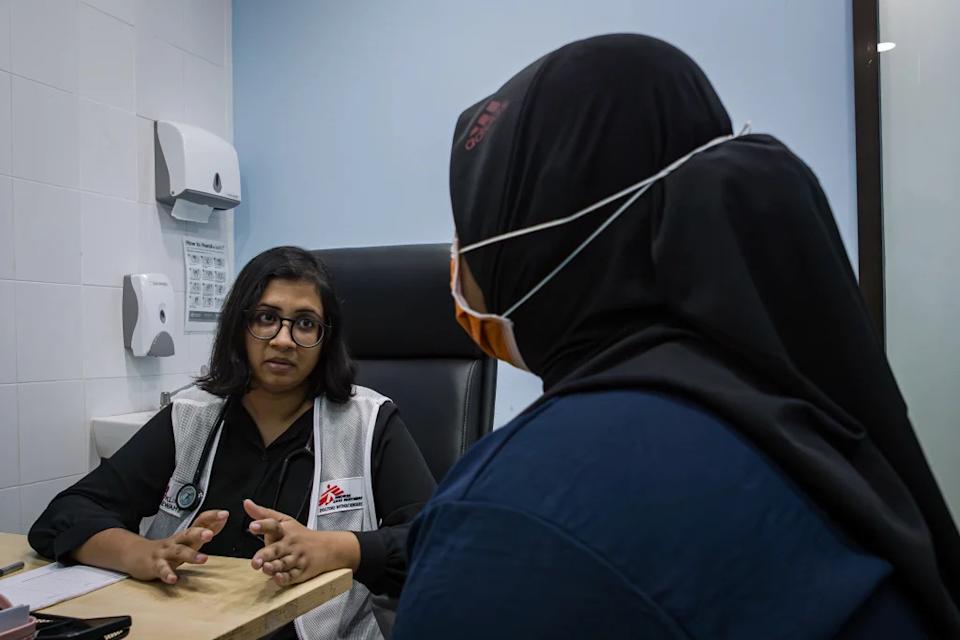 Dr Sara Ruth with a patient.