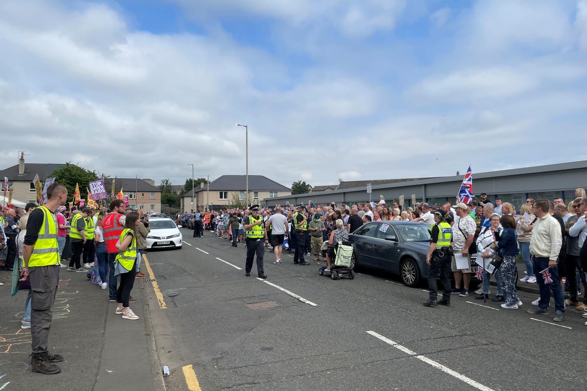 Anti-racism demonstrators square off against protesters shouting ‘send them home’ outside asylum hotel in Falkirk