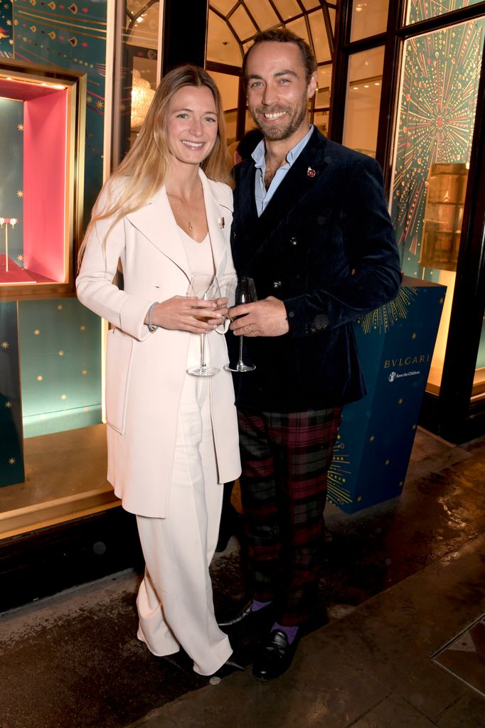 Alizee Thevenet in a cream outfit and Jamies Middleton in a velvet outfit